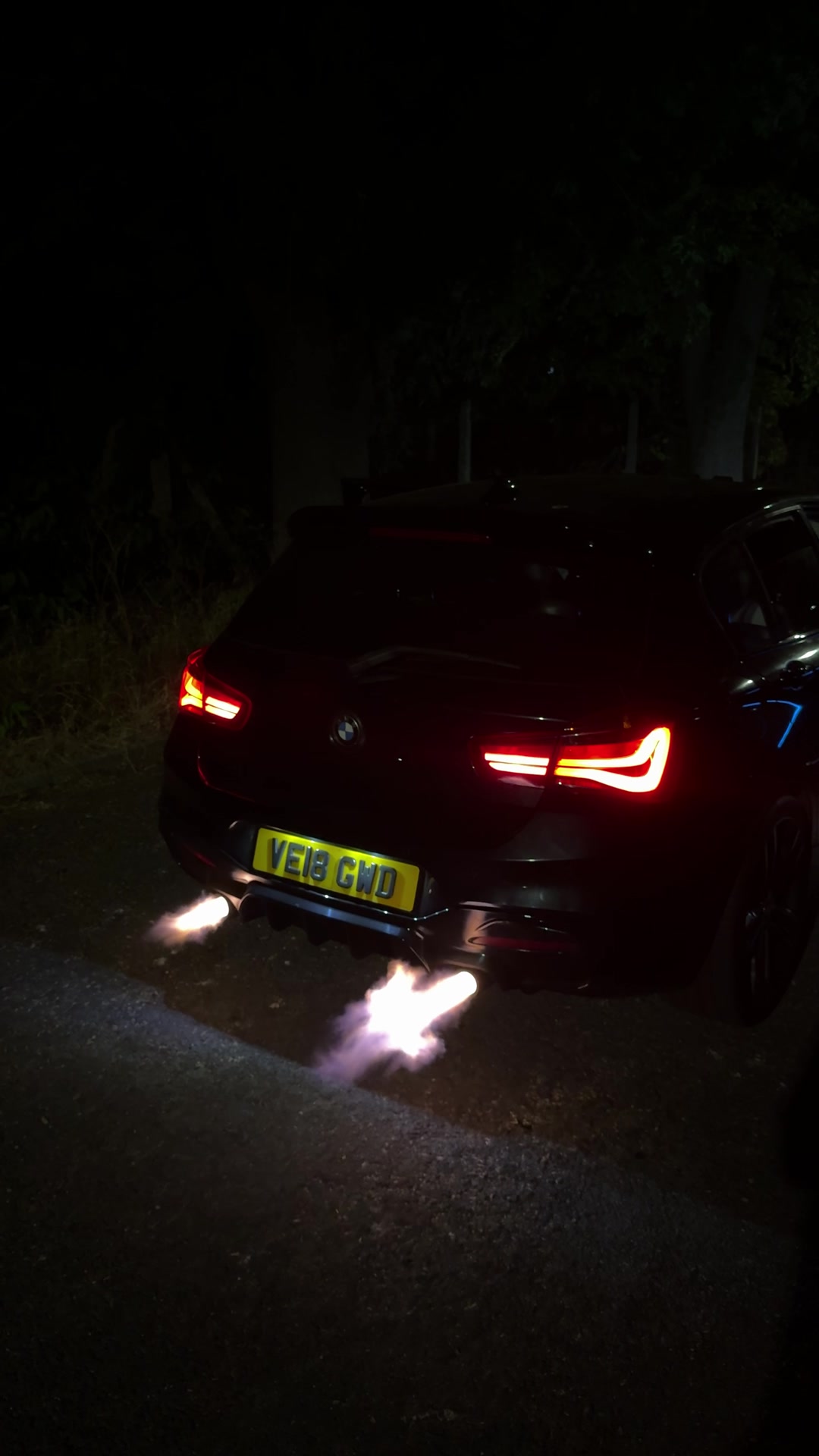Dynosty Performance BMW with a flame visible at the exhaust